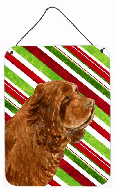 Sussex Spaniel Candy Cane Holiday Christmas Metal Wall or Door Hanging Prints by Caroline's Treasures