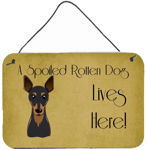 Min Pin Spoiled Dog Lives Here Wall or Door Hanging Prints BB1488DS812 by Caroline's Treasures