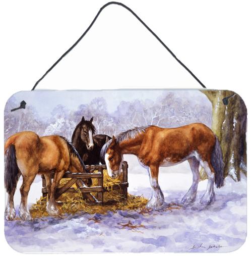 Horses eating Hay in the Snow Wall or Door Hanging Prints by Caroline's Treasures