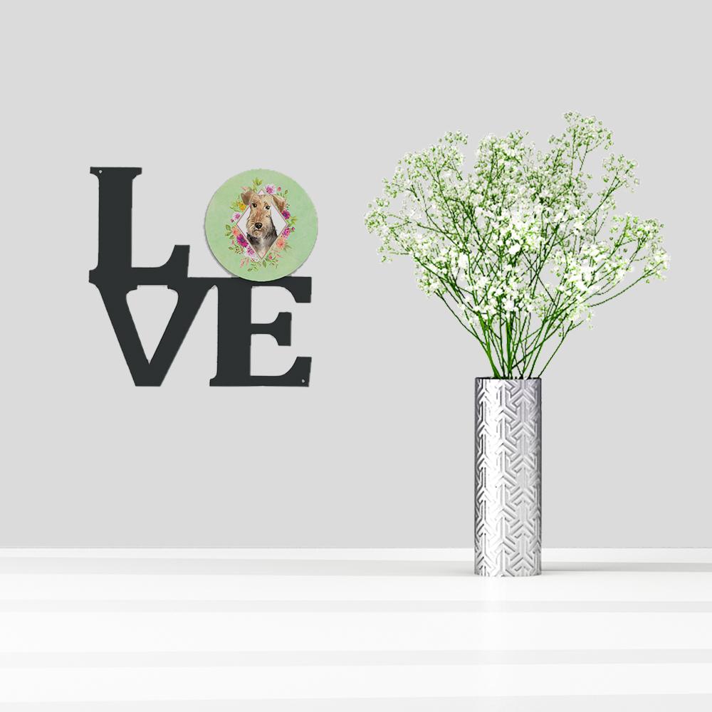 Airedale Terrier Green Flowers Metal Wall Artwork LOVE CK4364WALV by Caroline's Treasures