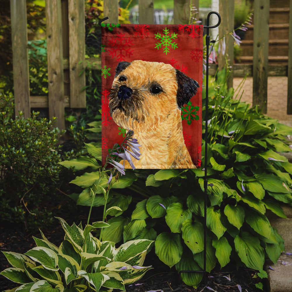 Border Terrier Red and Green Snowflakes Holiday Christmas Flag Garden Size.