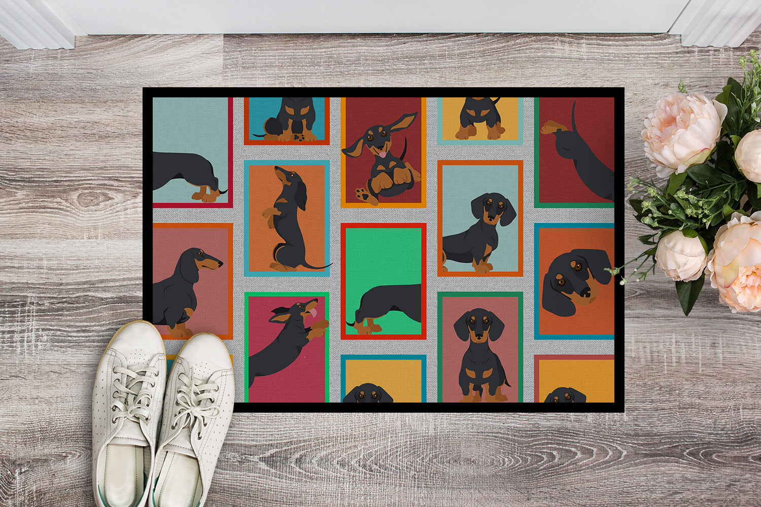Buy this Lots of Black and Tan Dachshund Indoor or Outdoor Mat 18x27