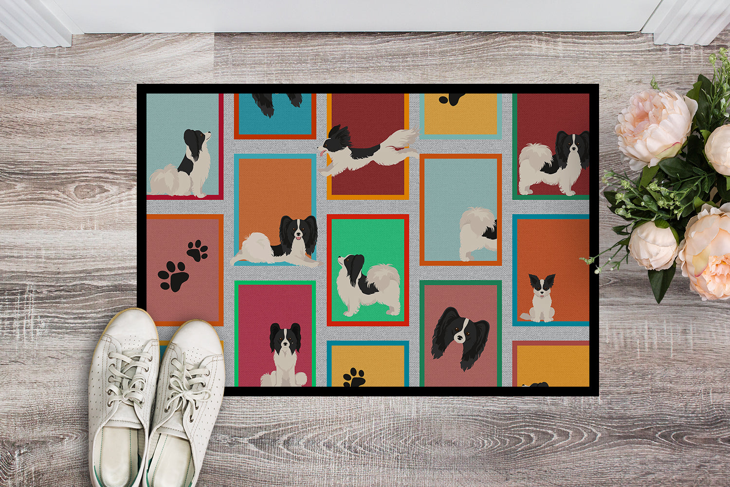 Buy this Lots of Black and Whtie Papillon Indoor or Outdoor Mat 24x36