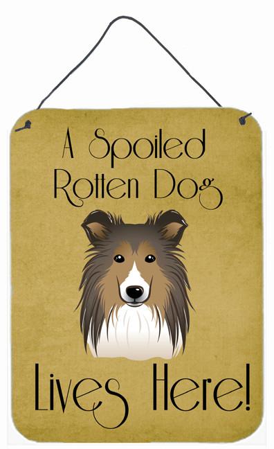 Sheltie Spoiled Dog Lives Here Wall or Door Hanging Prints BB1490DS1216 by Caroline's Treasures