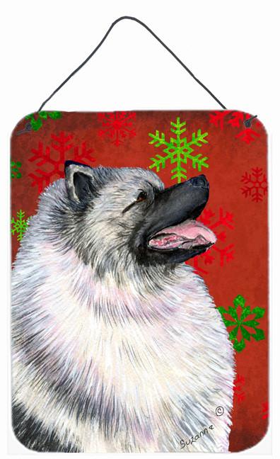 Keeshond Red and Green Snowflakes Holiday Christmas Wall or Door Hanging Prints by Caroline's Treasures