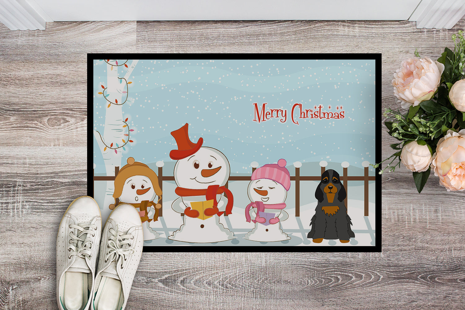 Caroline's Treasures Merry Christmas Carolers Cocker Spaniel Black Tan Doormat - 24x36 Decorative Floor Mat – Indoor/Outdoor Rug with Artistic Flair BB2424JMAT