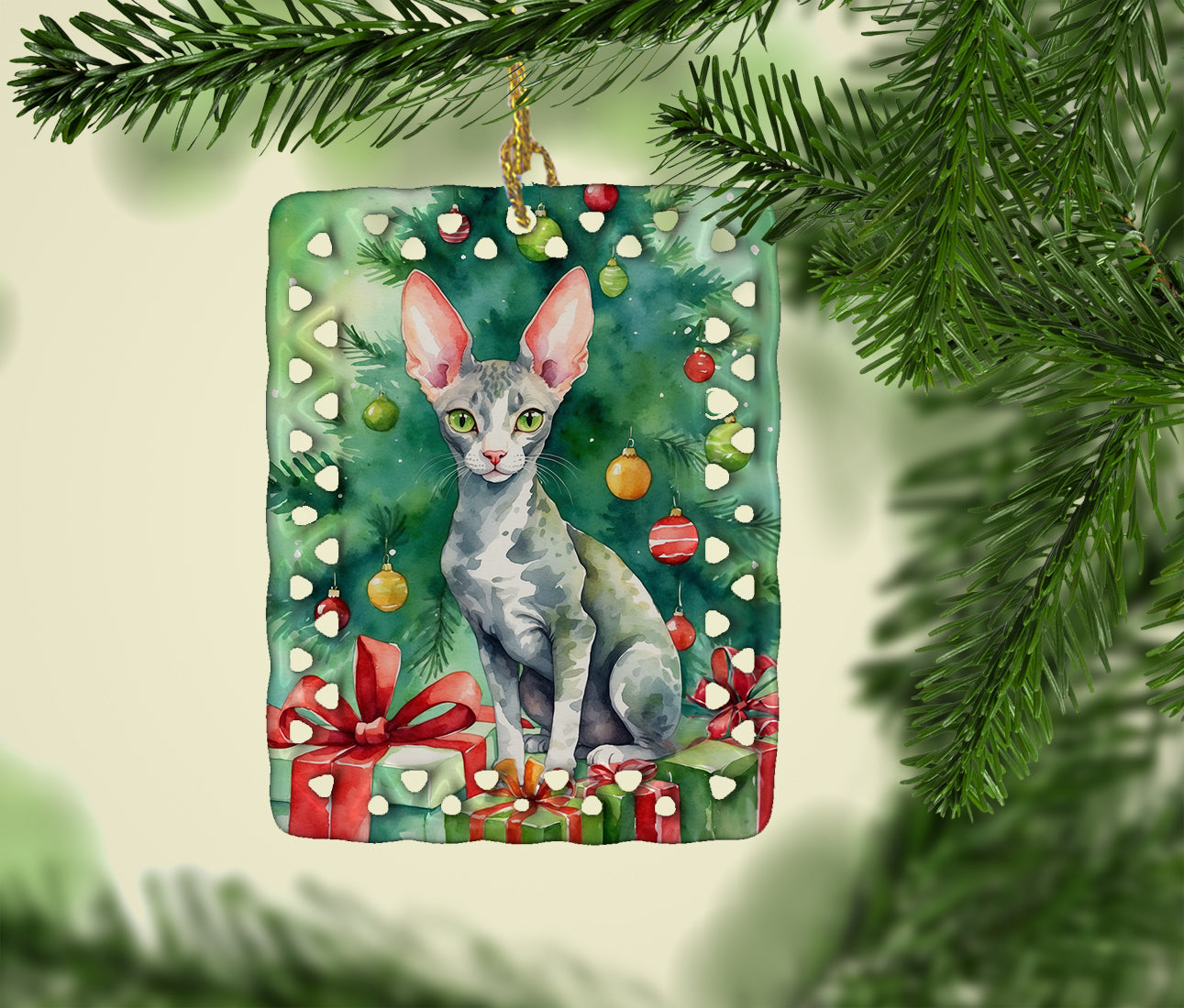 Caroline's Treasures Cornish Rex Cat By the Christmas Tree Porcelain Ornament