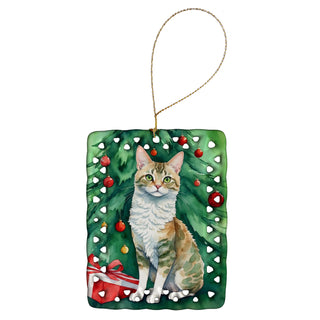 Caroline's Treasures Oregon Rex Cat By the Christmas Tree Porcelain Ornament