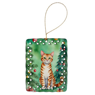 Caroline's Treasures Safari Cat By the Christmas Tree Porcelain Ornament
