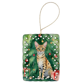 Caroline's Treasures Savannah Cat By the Christmas Tree Porcelain Ornament
