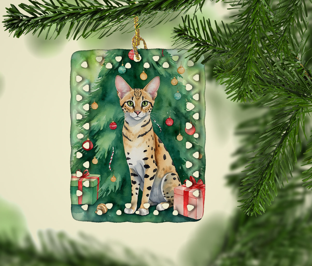 Caroline's Treasures Savannah Cat By the Christmas Tree Porcelain Ornament