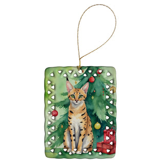 Caroline's Treasures Serengeti Cat By the Christmas Tree Porcelain Ornament