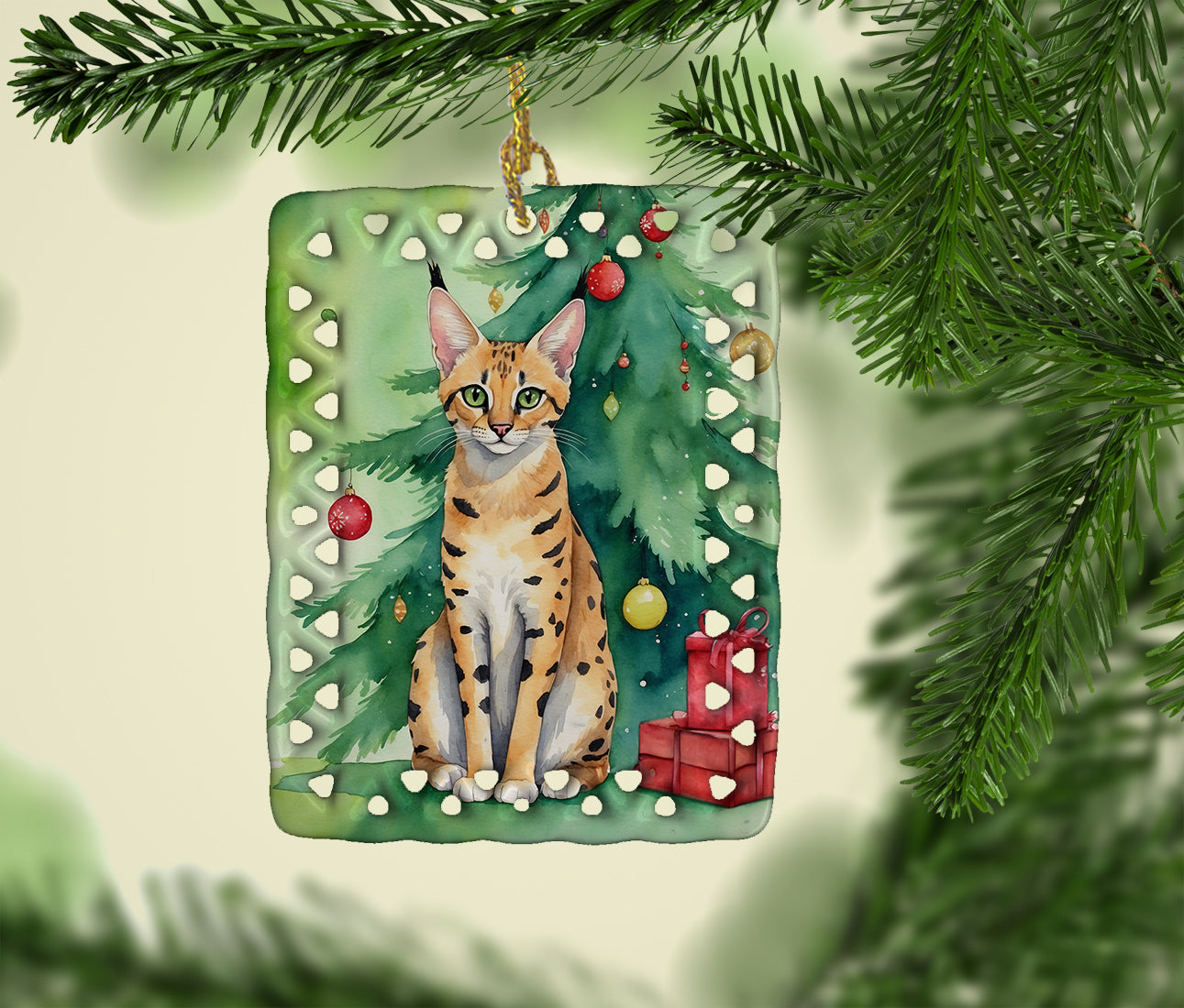 Caroline's Treasures Serengeti Cat By the Christmas Tree Porcelain Ornament