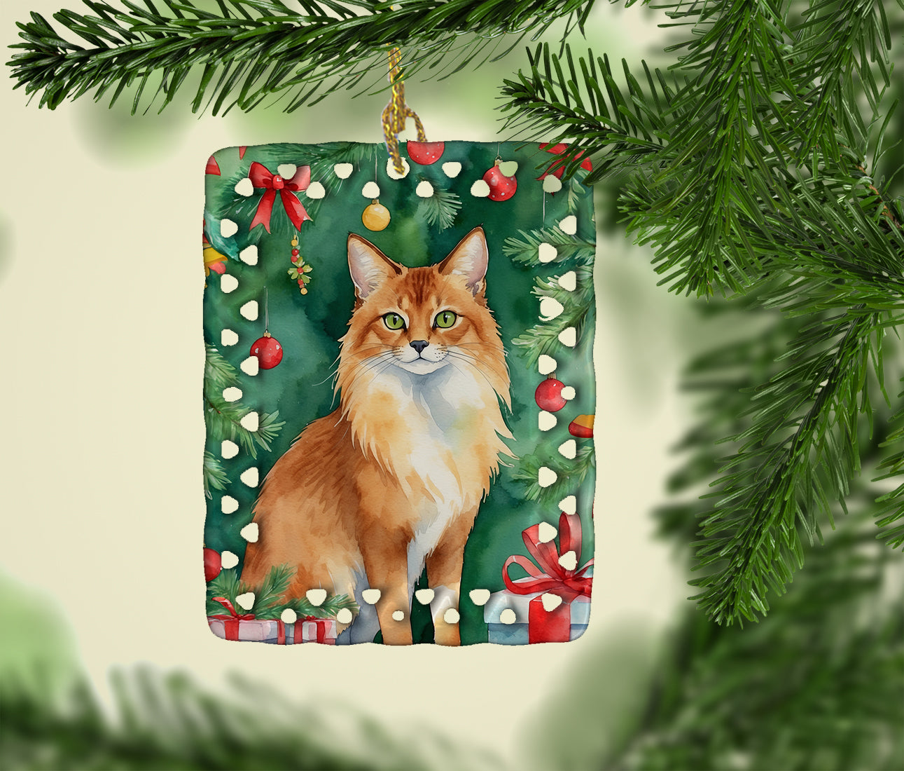 Caroline's Treasures Somali Cat By the Christmas Tree Porcelain Ornament