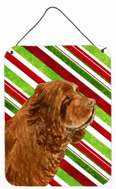Sussex Spaniel Candy Cane Holiday Christmas Metal Wall or Door Hanging Prints by Caroline&#39;s Treasures