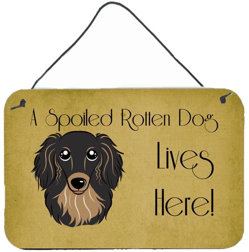 Longhair Black and Tan Dachshund Spoiled Dog Lives Here Wall or Door Hanging Prints BB1461DS812 by Caroline's Treasures