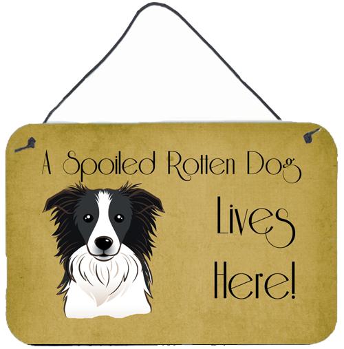 Border Collie Spoiled Dog Lives Here Wall or Door Hanging Prints BB1489DS812 by Caroline's Treasures