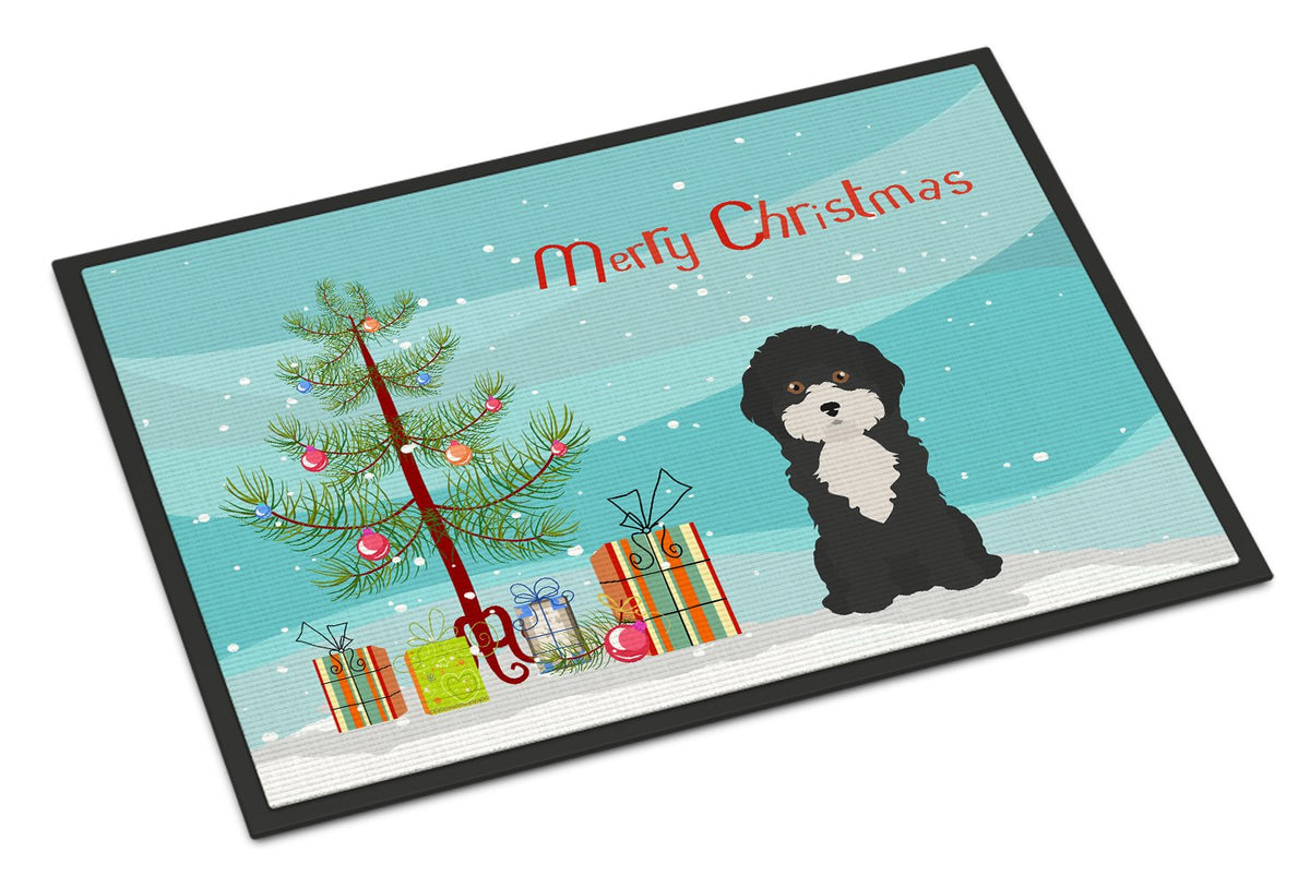 Black and White Cyprus Poodle Christmas Tree Indoor or Outdoor Mat 24x36 CK3497JMAT by Caroline&#39;s Treasures