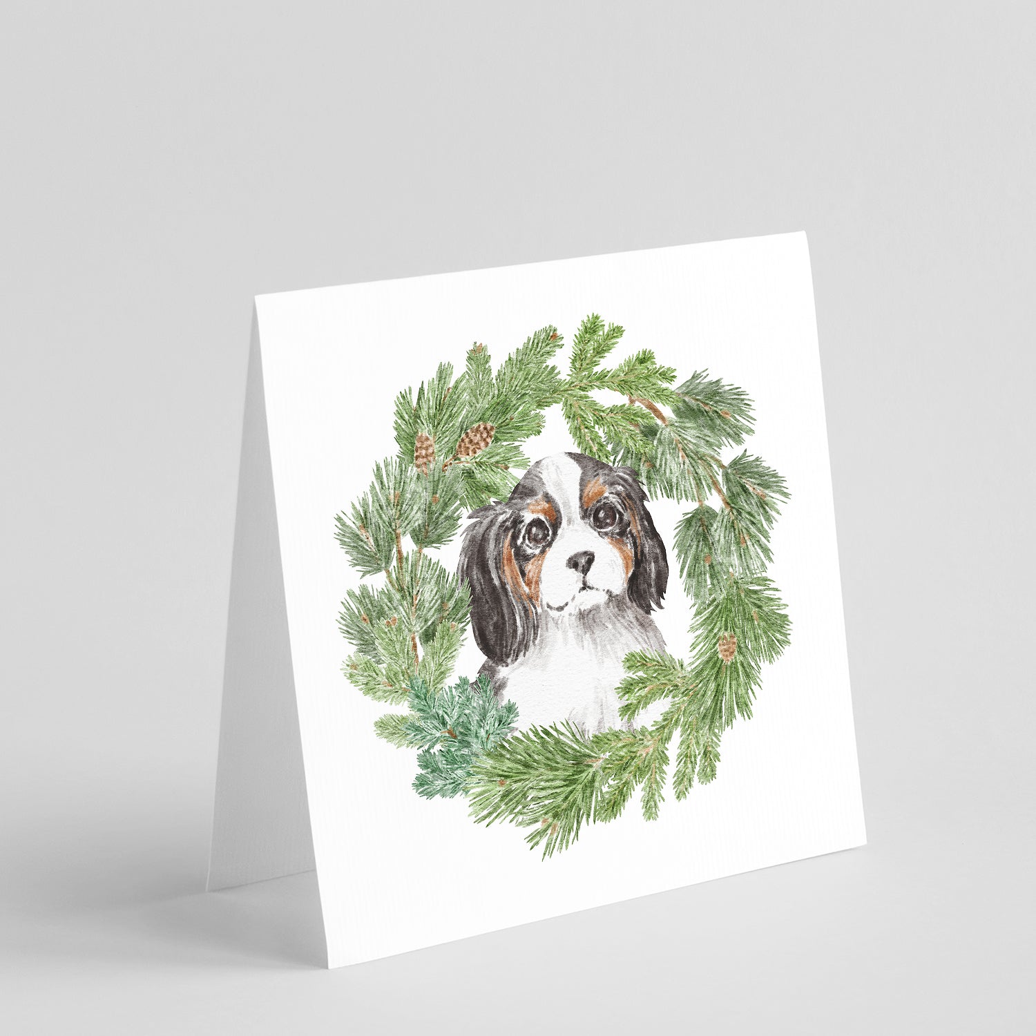 Buy this Cavalier King Charles Spaniel Puppy Tricolor with Christmas Wreath Square Greeting Cards and Envelopes Pack of 8