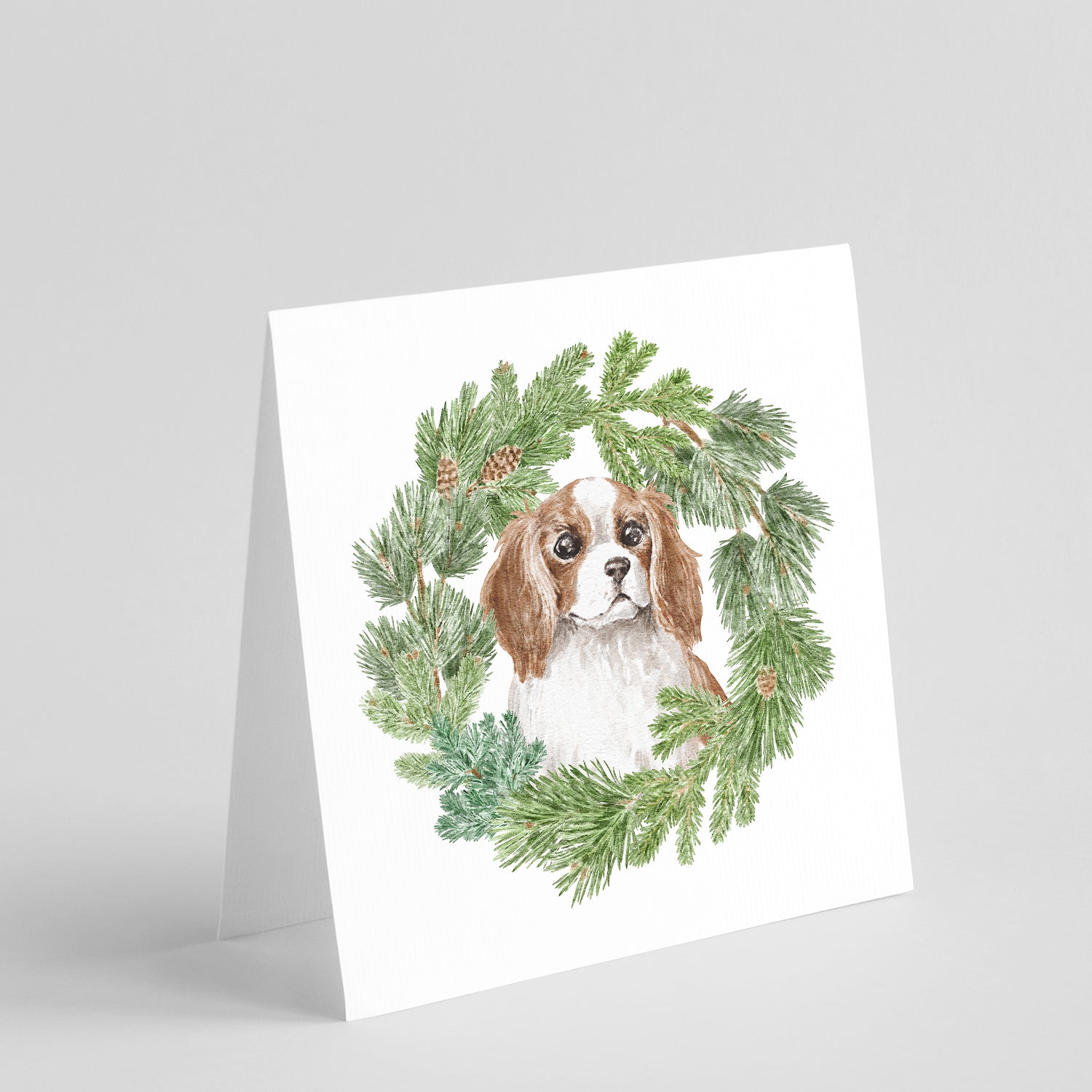 Buy this Cavalier King Charles Spaniel Blenheim Puppy Wide Eyed with Christmas Wreath Square Greeting Cards and Envelopes Pack of 8