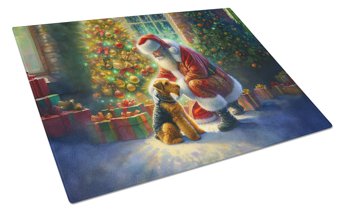 Buy this Airedale Terrier and Santa Claus Glass Cutting Board