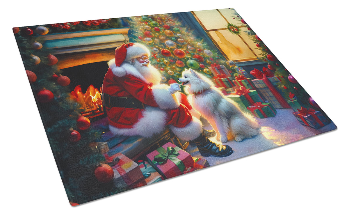 Buy this American Eskimo and Santa Claus Glass Cutting Board