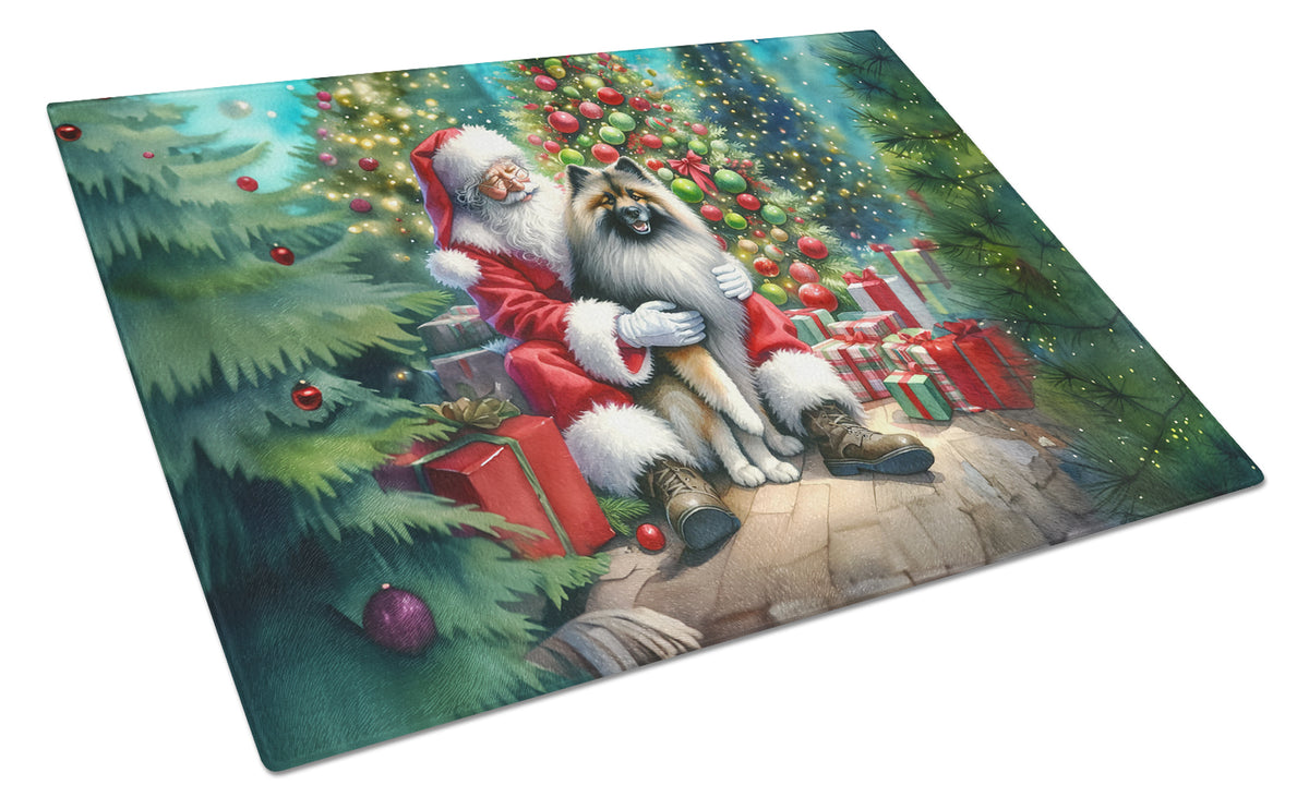 Buy this Keeshond and Santa Claus Glass Cutting Board