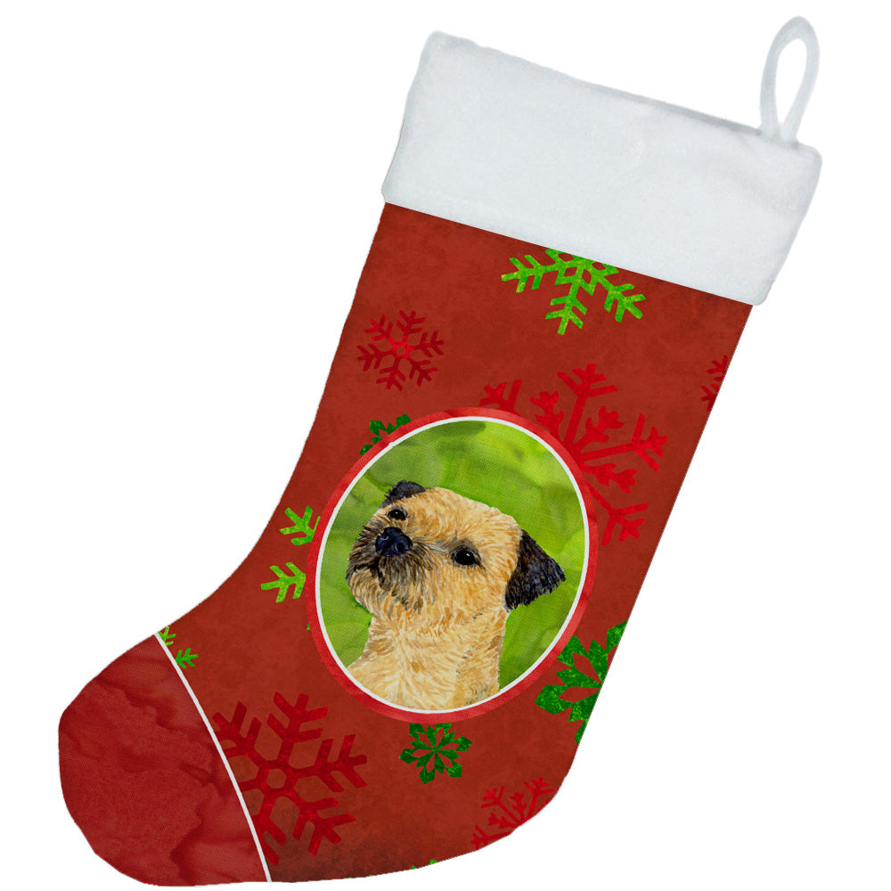 Border Terrier Red and Green Snowflakes Holiday Christmas Christmas Stocking  the-store.com.