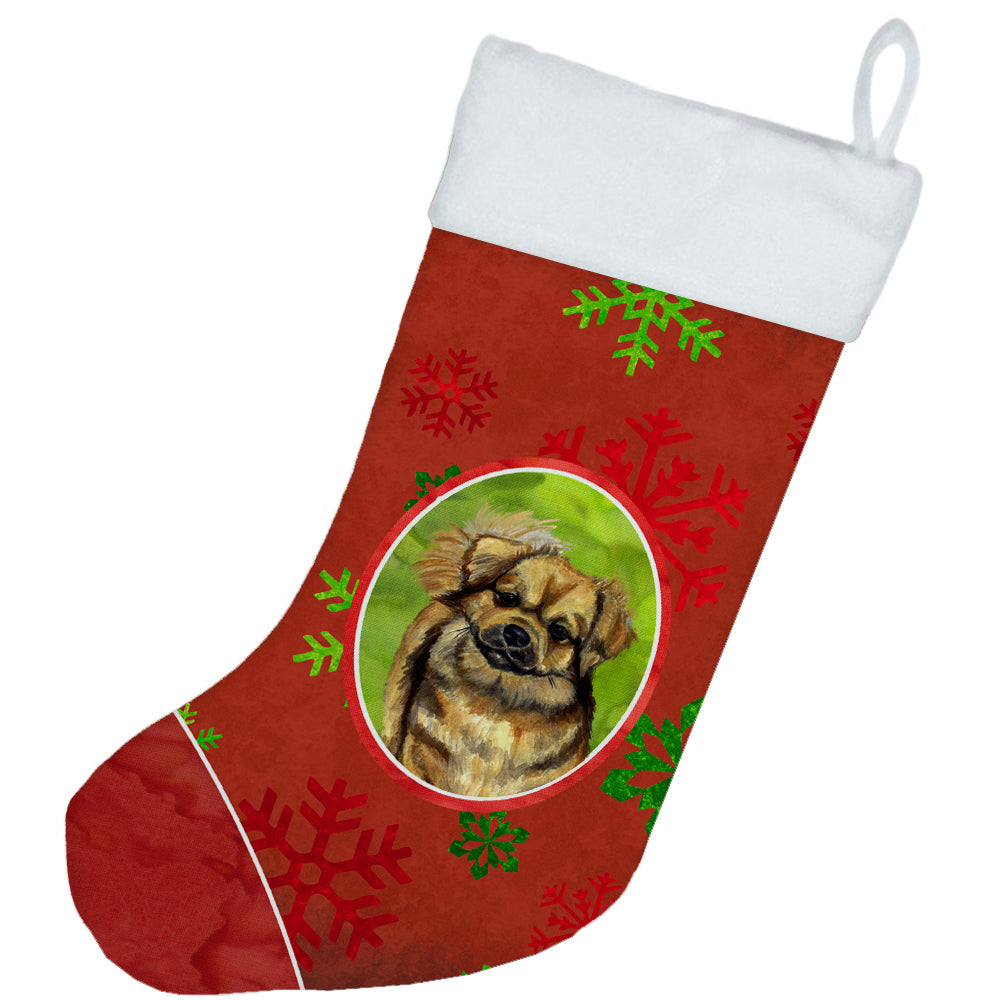 Tibetan Spaniel Red and Green Snowflakes Holiday Christmas  Stocking  the-store.com.