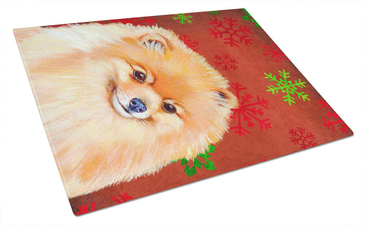 Pomeranian Red and Green Snowflakes Holiday Christmas Glass Cutting Board Large by Caroline&#39;s Treasures