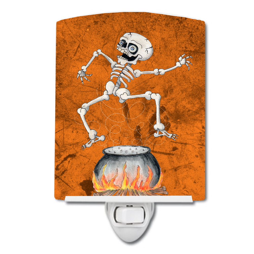 Caroline's Treasures Skeleton jumping from Witches Caldron Halloween Ceramic Night Light SB3013CNL