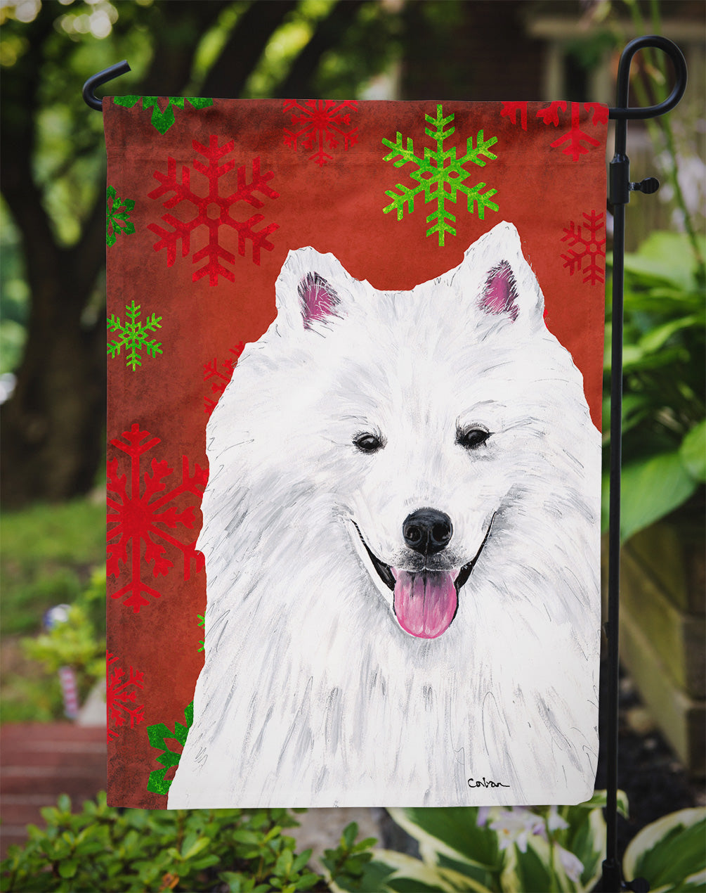 American Eskimo Red and Green Snowflakes Holiday Christmas Flag Garden Size.