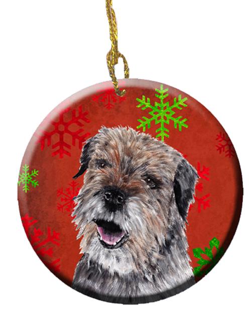 Border Terrier Red Snowflakes Holiday Ceramic Ornament SC9585CO1 by Caroline&#39;s Treasures