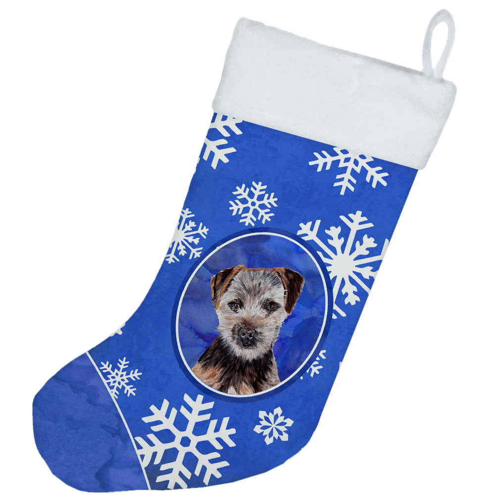 Caroline's Treasures Norfolk Terrier Puppy Winter Snowflakes Christmas Stocking SC9783-CS