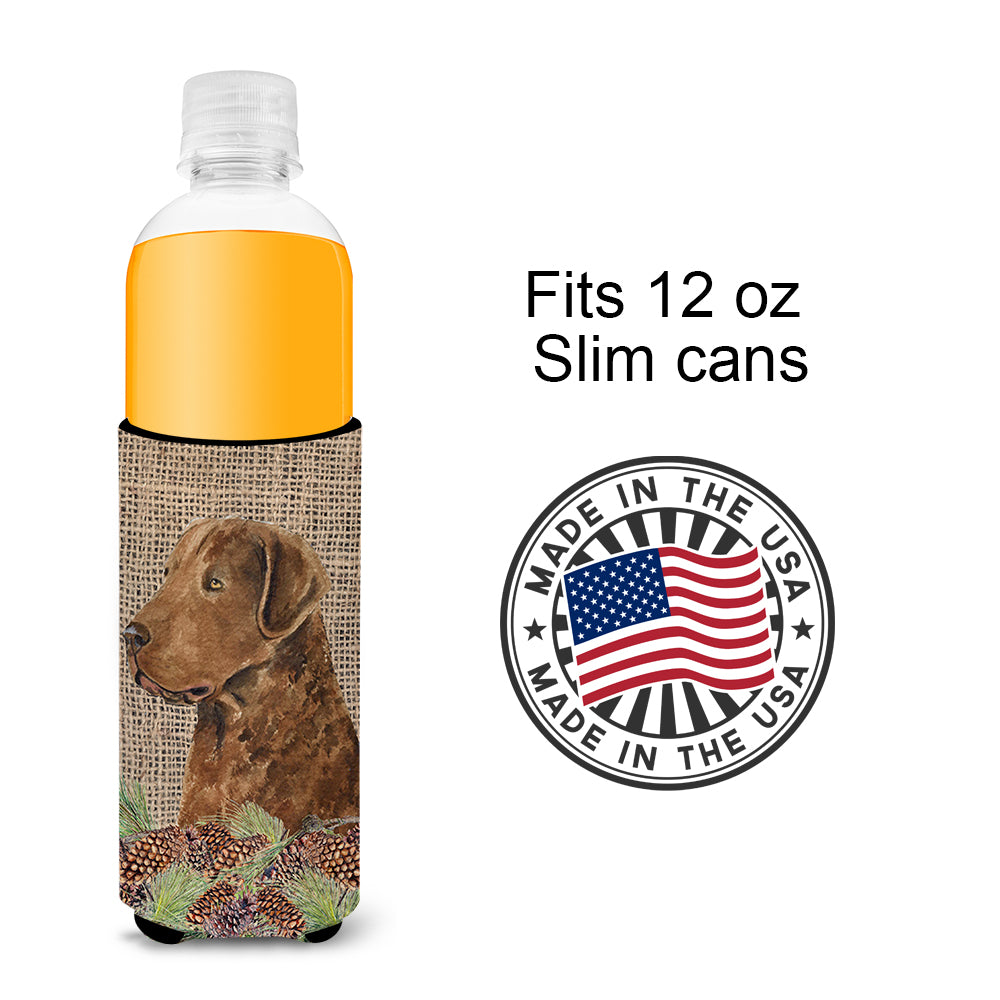 Curly Coated Retriever on Faux Burlap with Pine Cones Ultra Beverage Insulators for slim cans SS4108MUK.