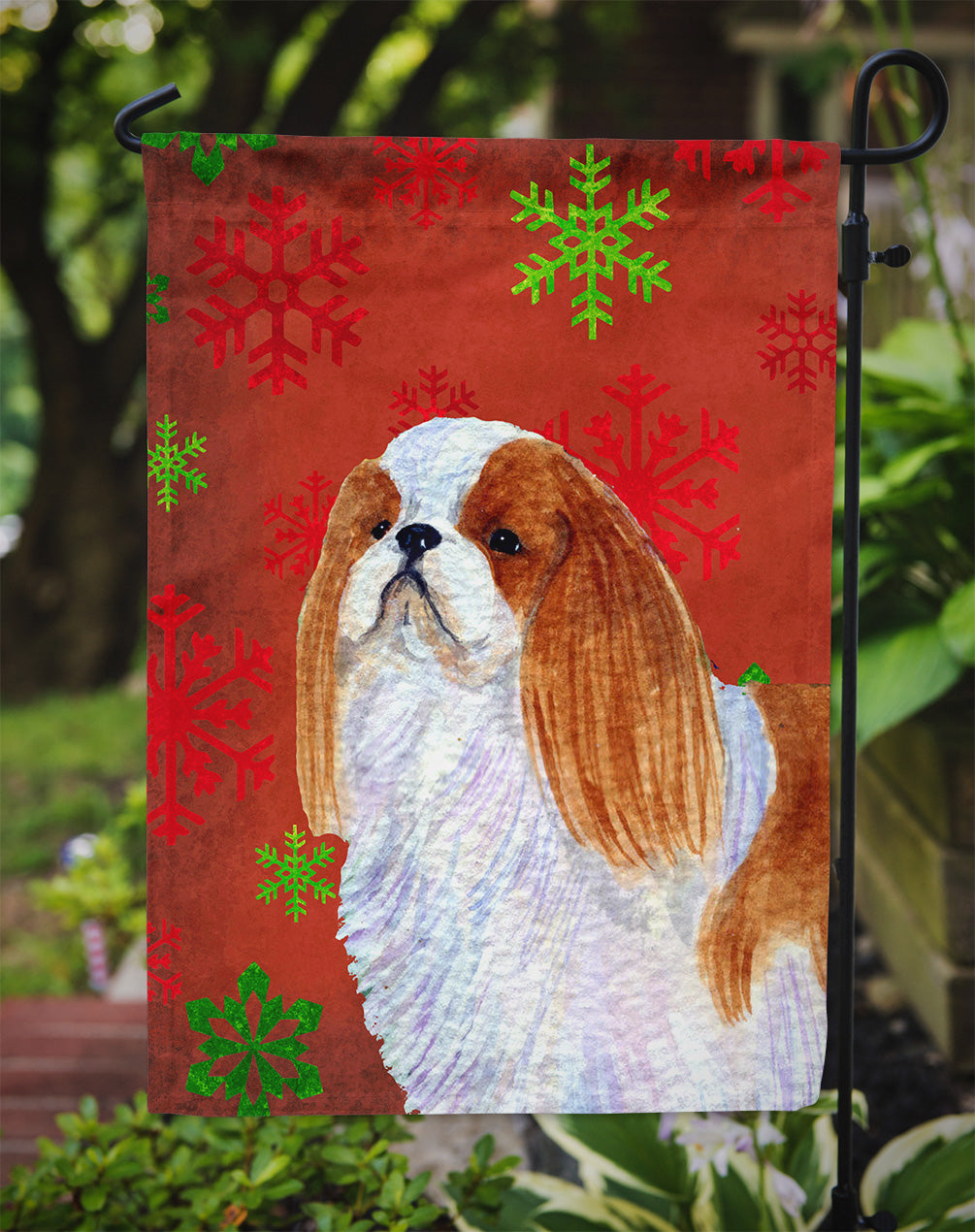 English Toy Spaniel Red and Green Snowflakes Holiday Christmas Flag Garden Size.