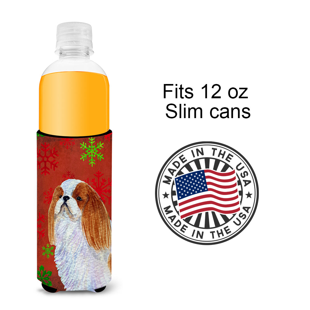 English Toy Spaniel Red and Green Snowflakes Holiday Christmas Ultra Beverage Insulators for slim cans SS4714MUK.