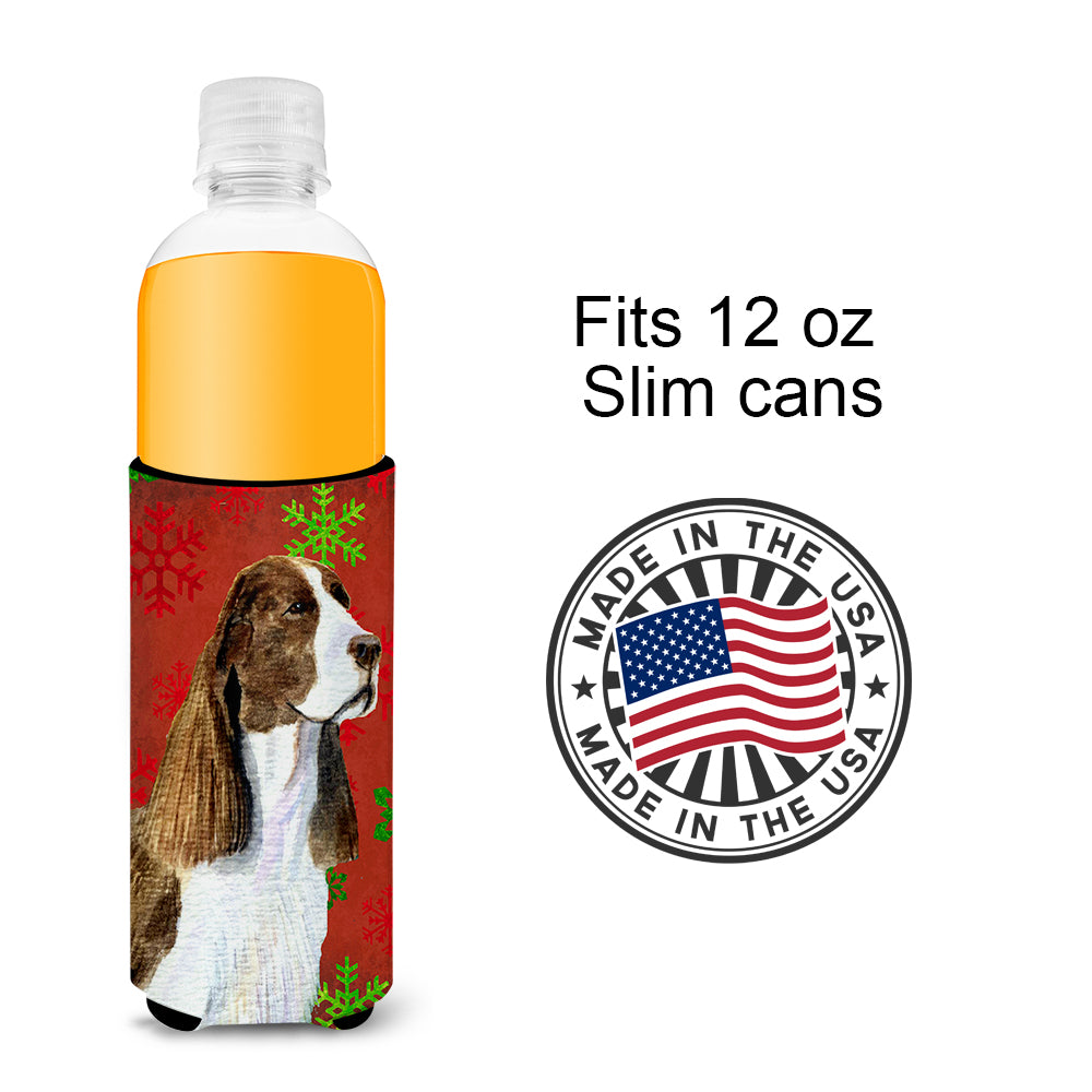 Springer Spaniel Red and Green Snowflakes Holiday Christmas Ultra Beverage Insulators for slim cans SS4720MUK.