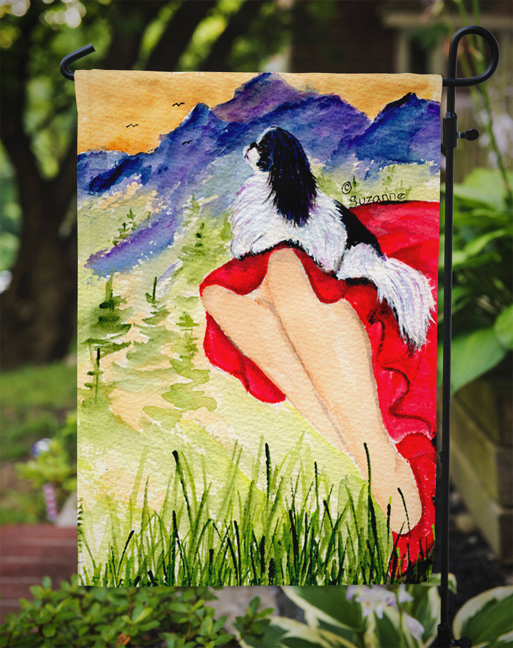 Lady with her Japanese Chin Flag Garden Size.