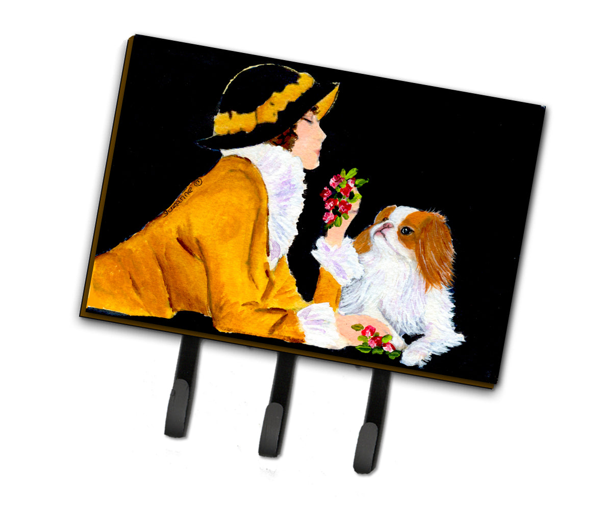 Lady with her Japanese Chin Leash Holder or Key Hook